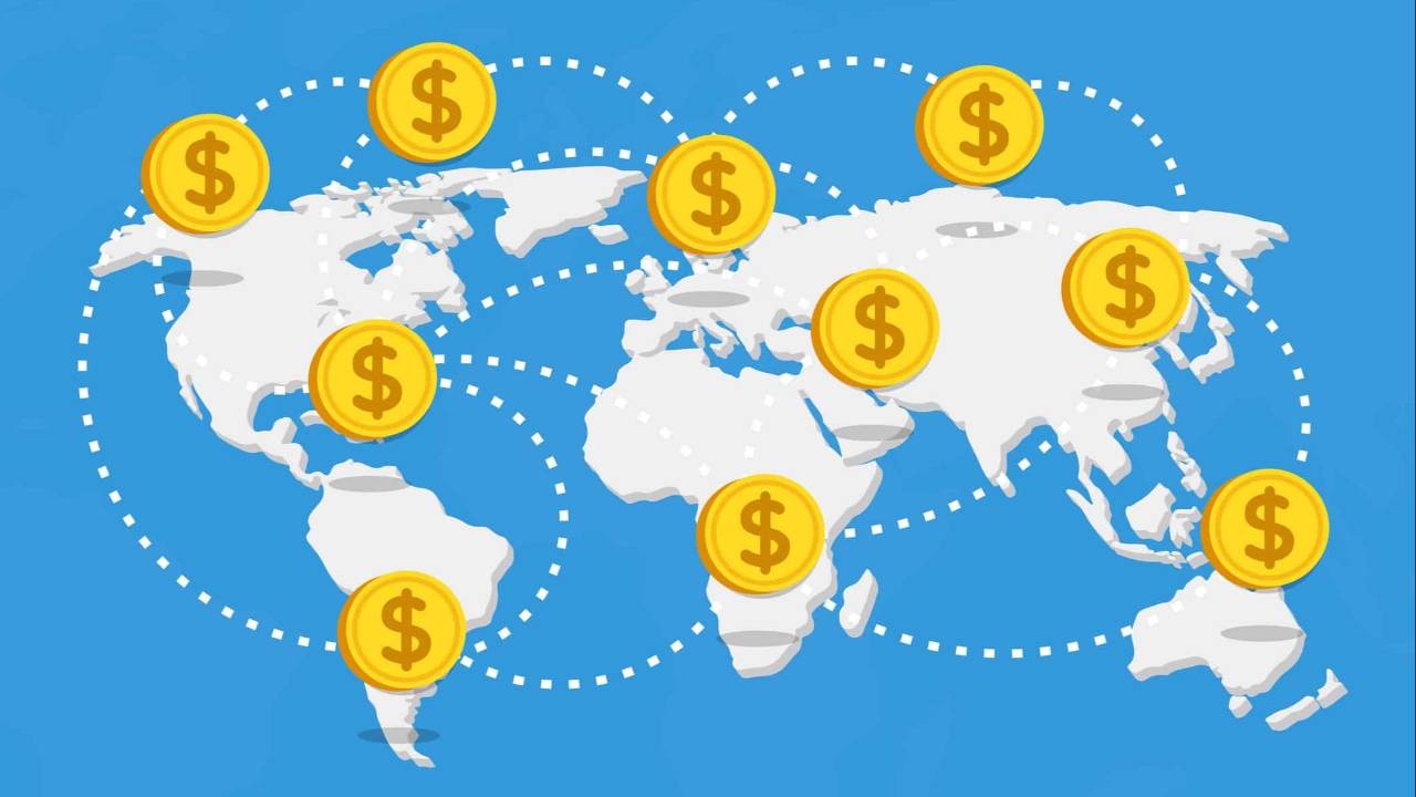 Dibujo de un mapamundi con grandes monedas que representan las economías emergentes